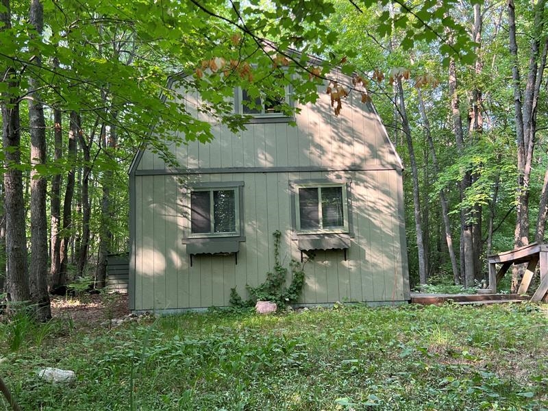 47 South 47 3/4 Road Cadillac, MI 49601 - Photo 1 of 59