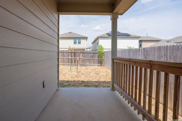 a view of backyard from balcony