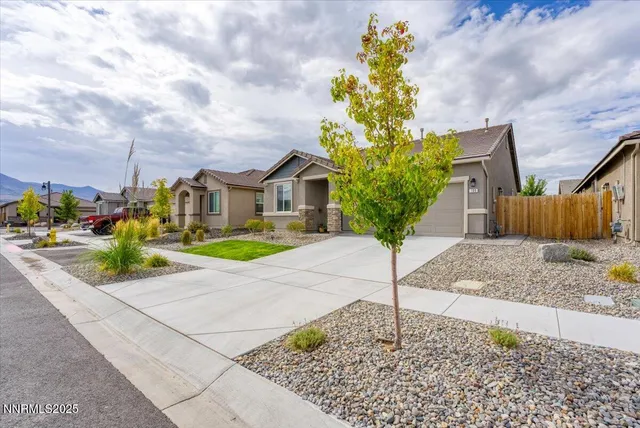 a house with yard in front of it