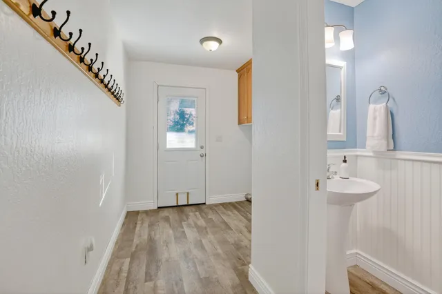 a view of bathroom with dual sinks