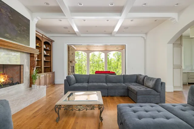 a view of living room with furniture and a flat screen tv