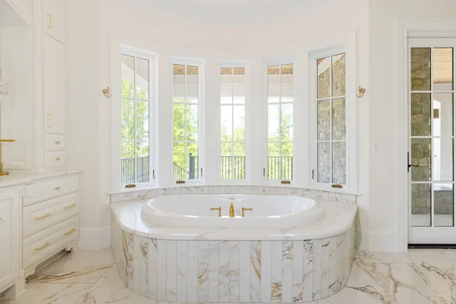 a living room with furniture flat screen tv and fireplace
