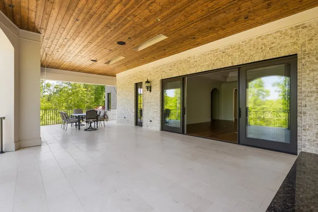 a kitchen with stainless steel appliances a stove and a microwave