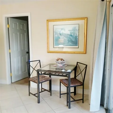 a view of a livingroom with furniture and a window