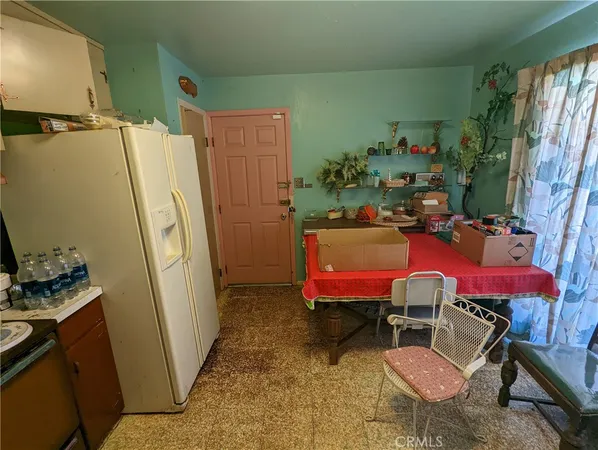 a room with furniture and a window
