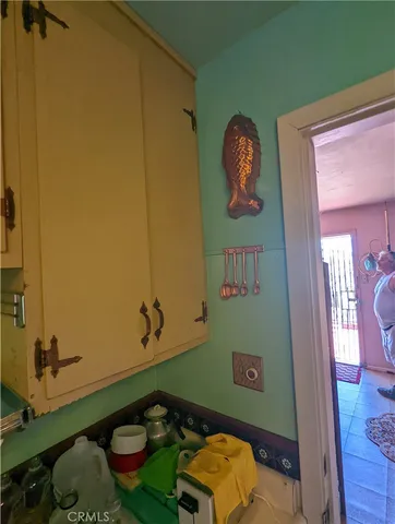 a room with toys and a wooden bench