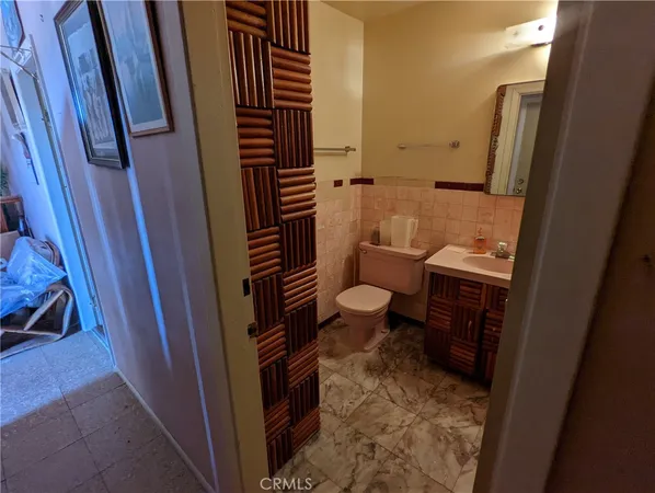 a bathroom with a sink and toilet