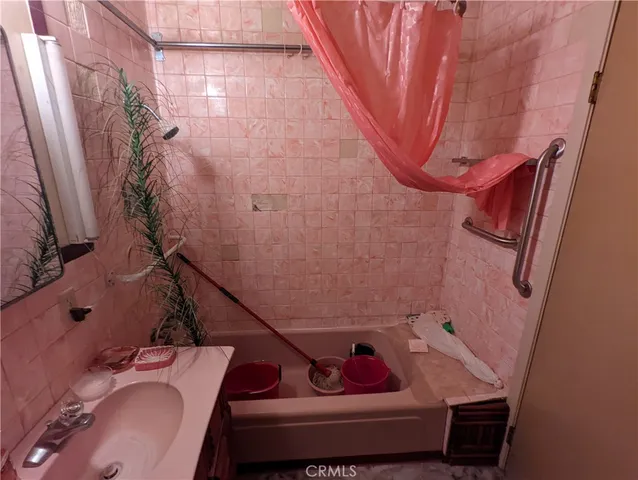 a bathroom with a sink and toilet