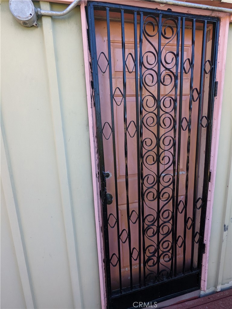 4175 Ferrand Road Lucerne, CA 95458 - Photo 34 of 44 a view of a door with a plant