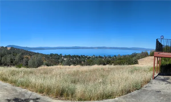 a view of mountain with lake view