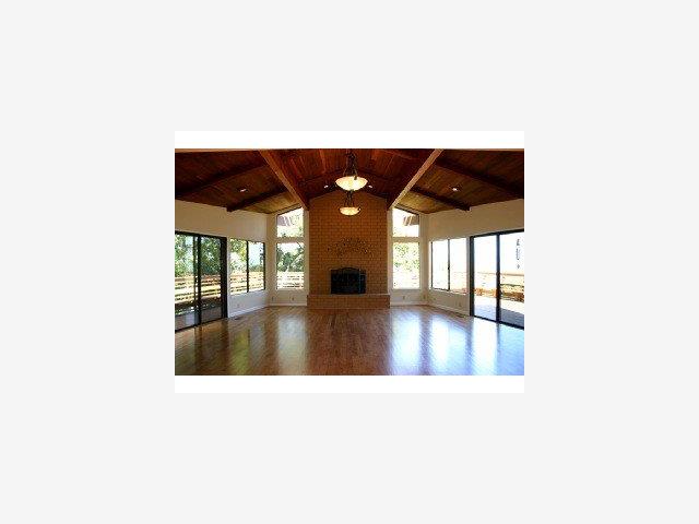 22330 Regnart Road Cupertino, CA 95014 - Photo 6 of 9 a picture of a living room with a couch