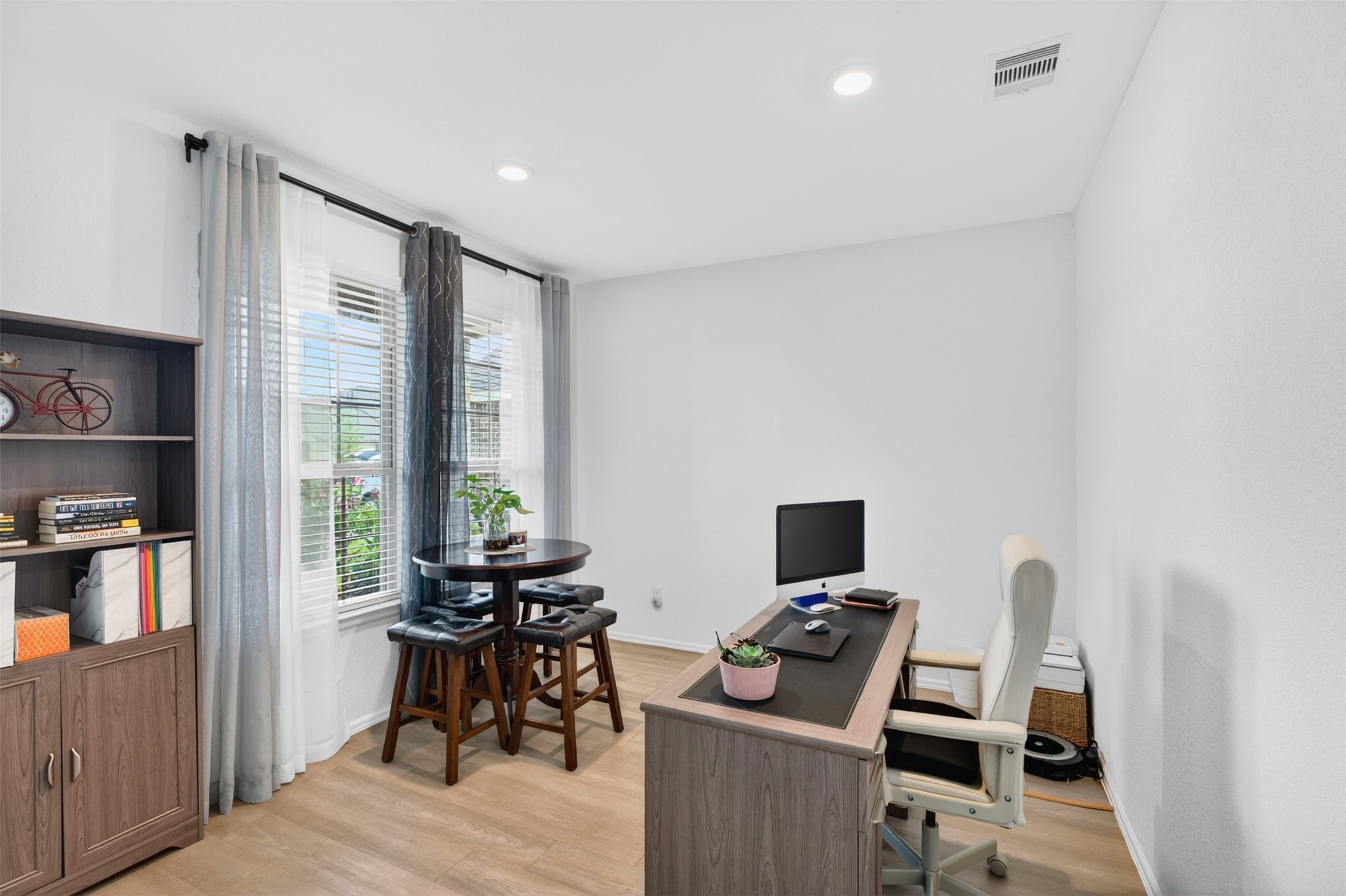 2832 Mistygate Court Conroe, TX 77301 - Photo 12 of 50 Versatile study, home office, or flex room offering the perfect space for working from home, a playroom, hobby room, or additional sitting area.