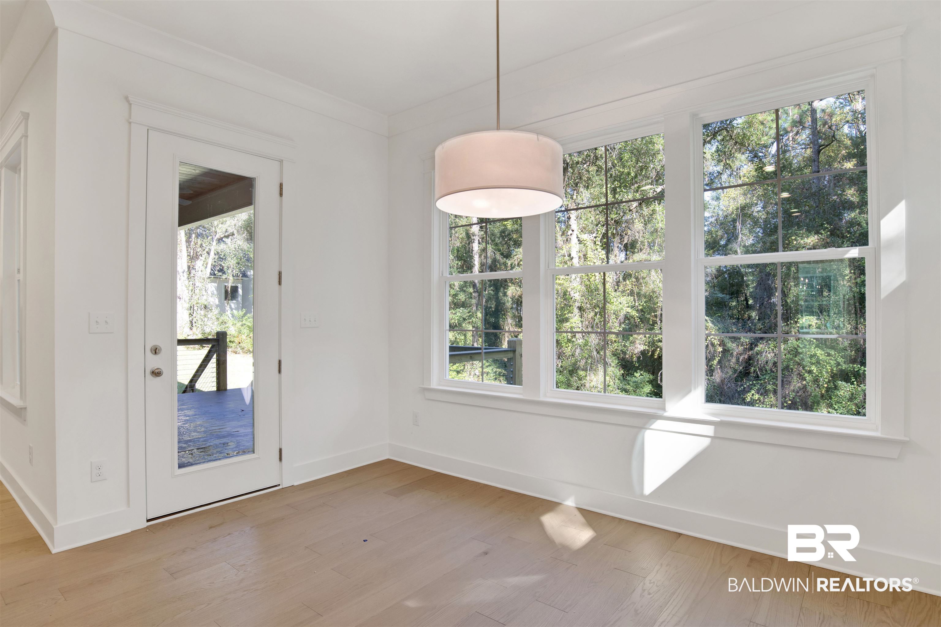 5 Long Leaf Circle Fairhope, AL 36532 - Photo 14 of 44 Unfurnished dining area with light hardwood / wood-style flooring
