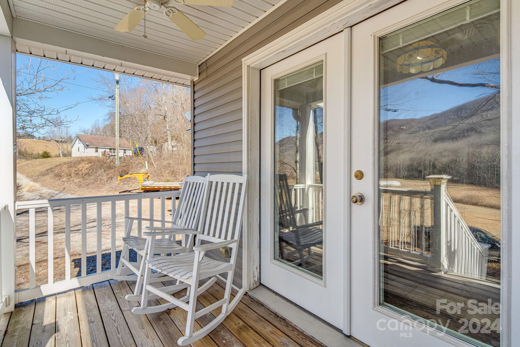 10 Bailey Ridge Road Black Mountain, NC 28711 - Photo 11 of 44 a view of a balcony with chairs