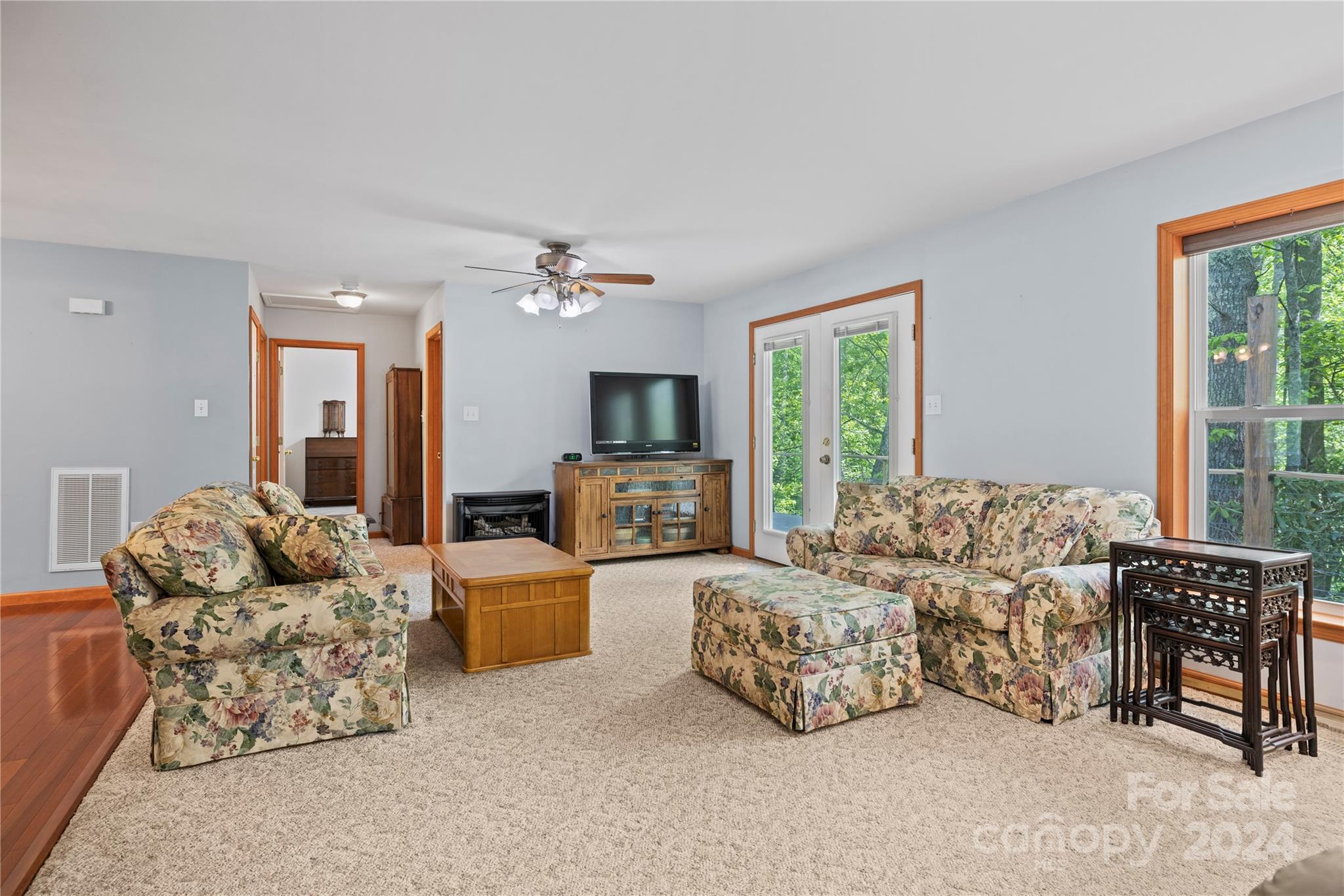 10 Bailey Ridge Road Black Mountain, NC 28711 - Photo 17 of 44 a living room with furniture and a flat screen tv