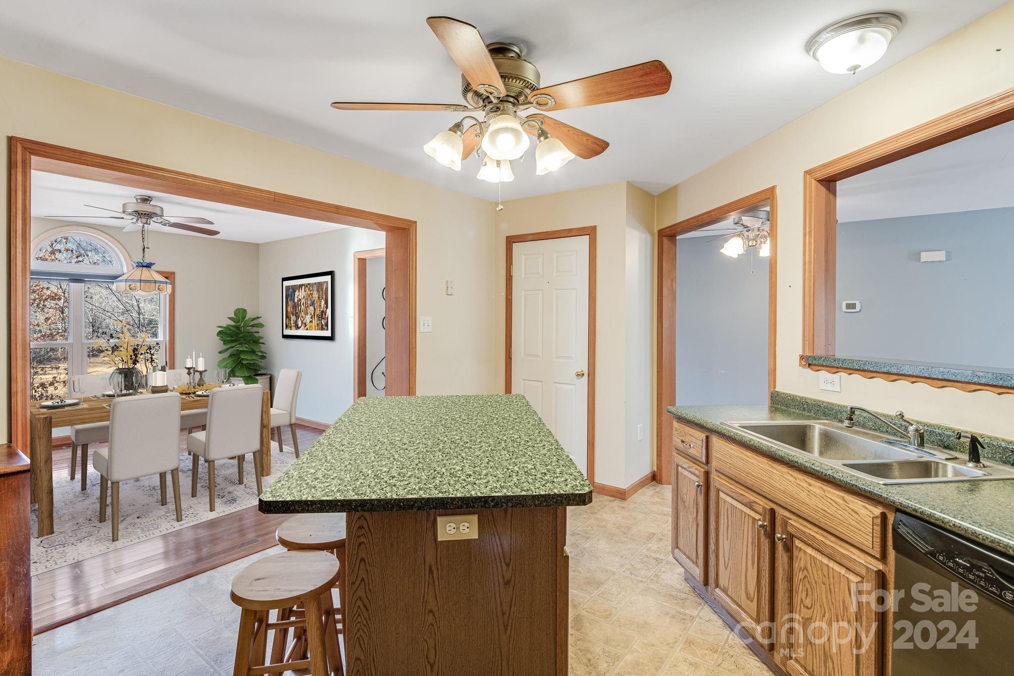 10 Bailey Ridge Road Black Mountain, NC 28711 - Photo 19 of 44 a kitchen with a table and chairs