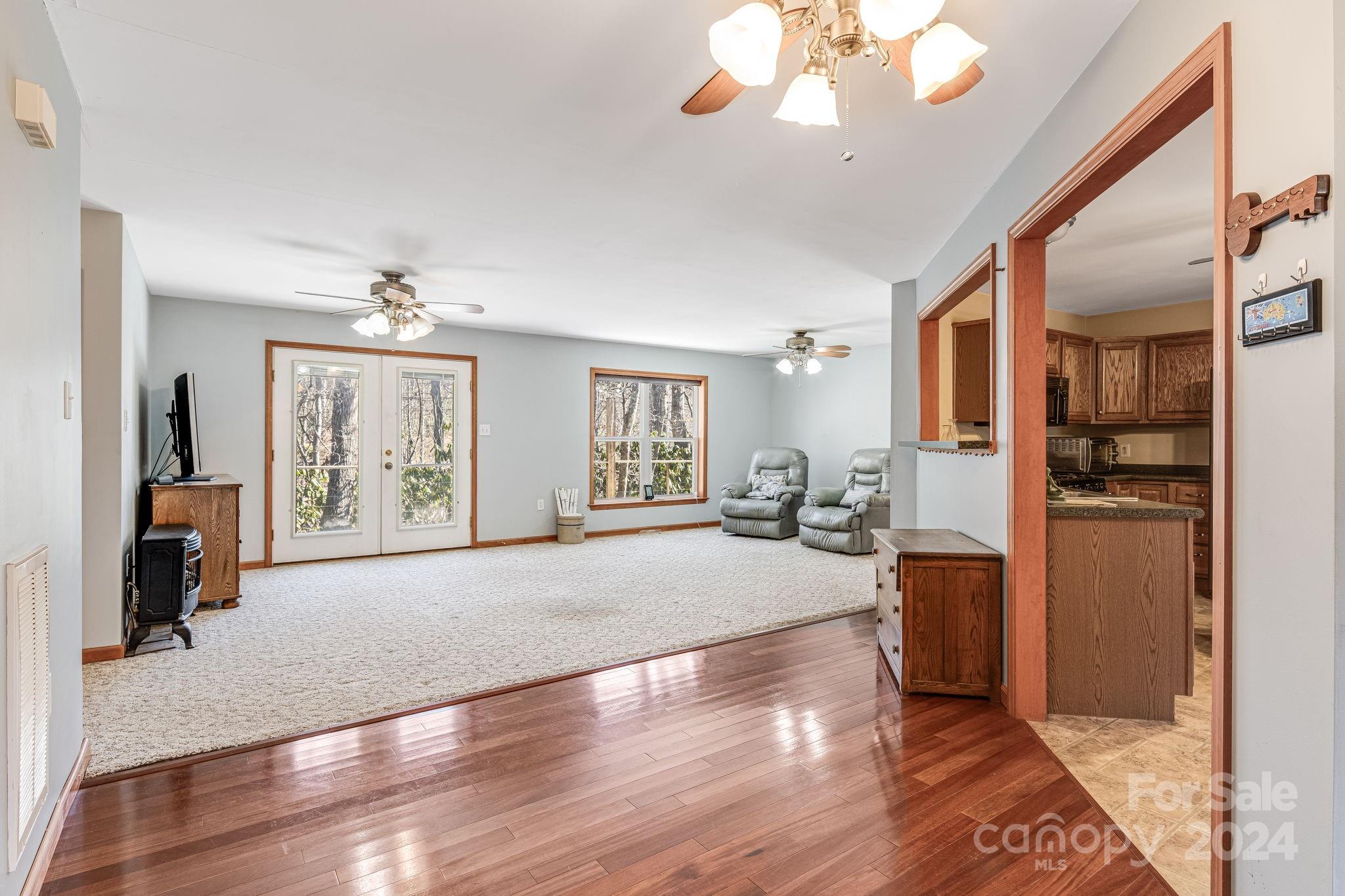 10 Bailey Ridge Road Black Mountain, NC 28711 - Photo 24 of 44 a living room with furniture and a chandelier