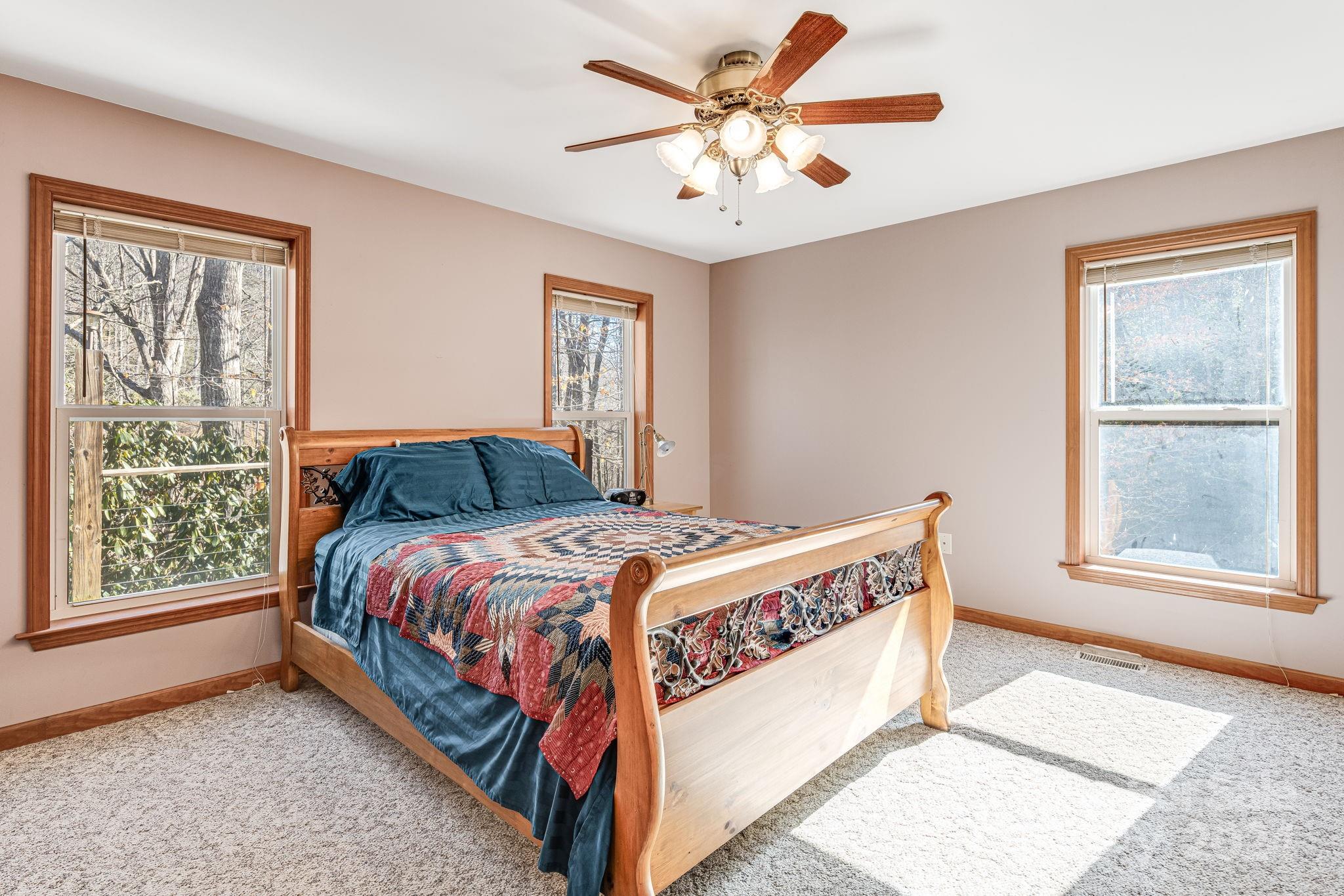 10 Bailey Ridge Road Black Mountain, NC 28711 - Photo 25 of 44 a bedroom with a bed and a window