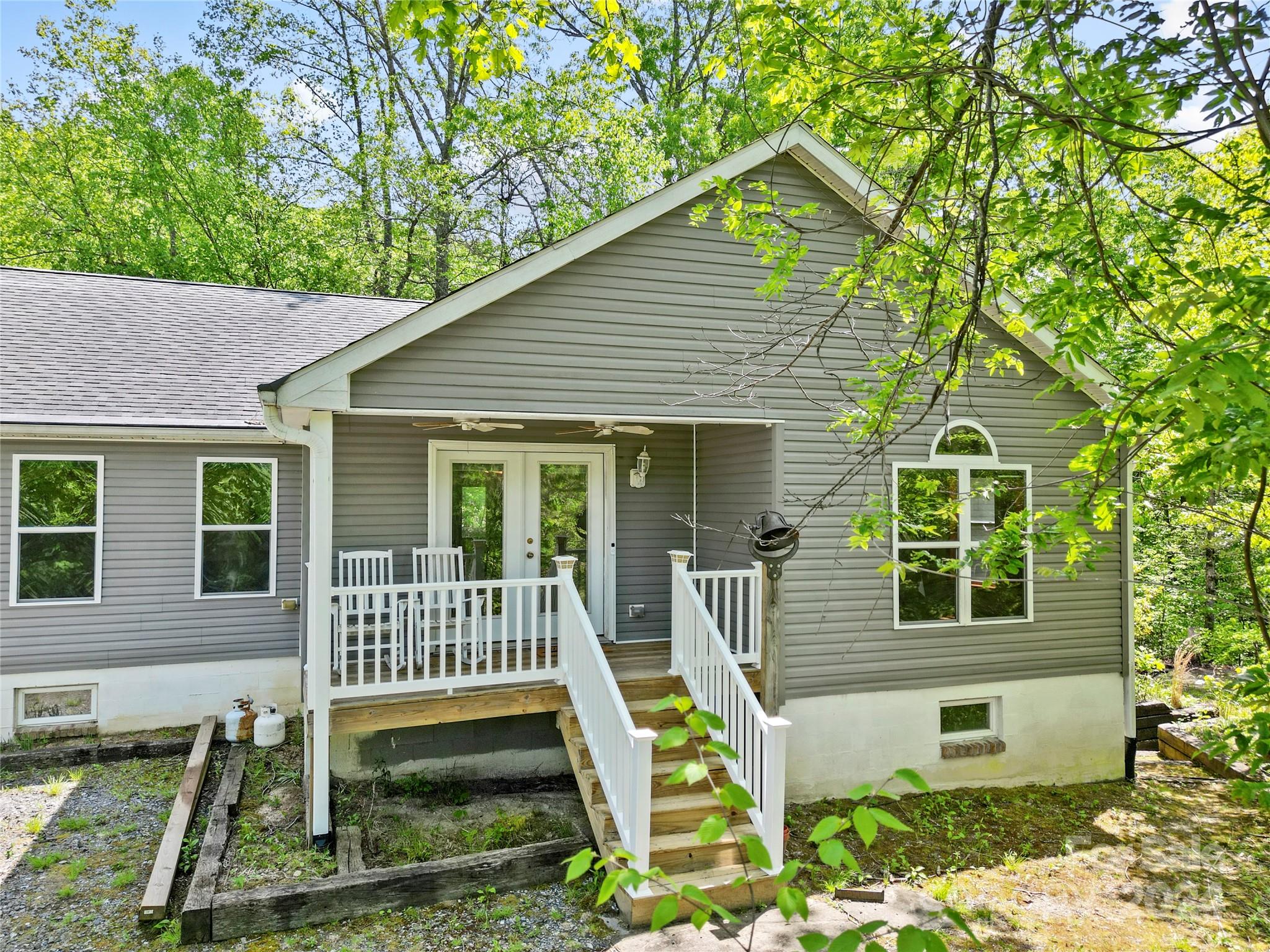 10 Bailey Ridge Road Black Mountain, NC 28711 - Photo 33 of 44 a front view of a house with a yard