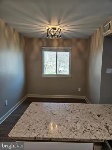 a view of a livingroom with a window