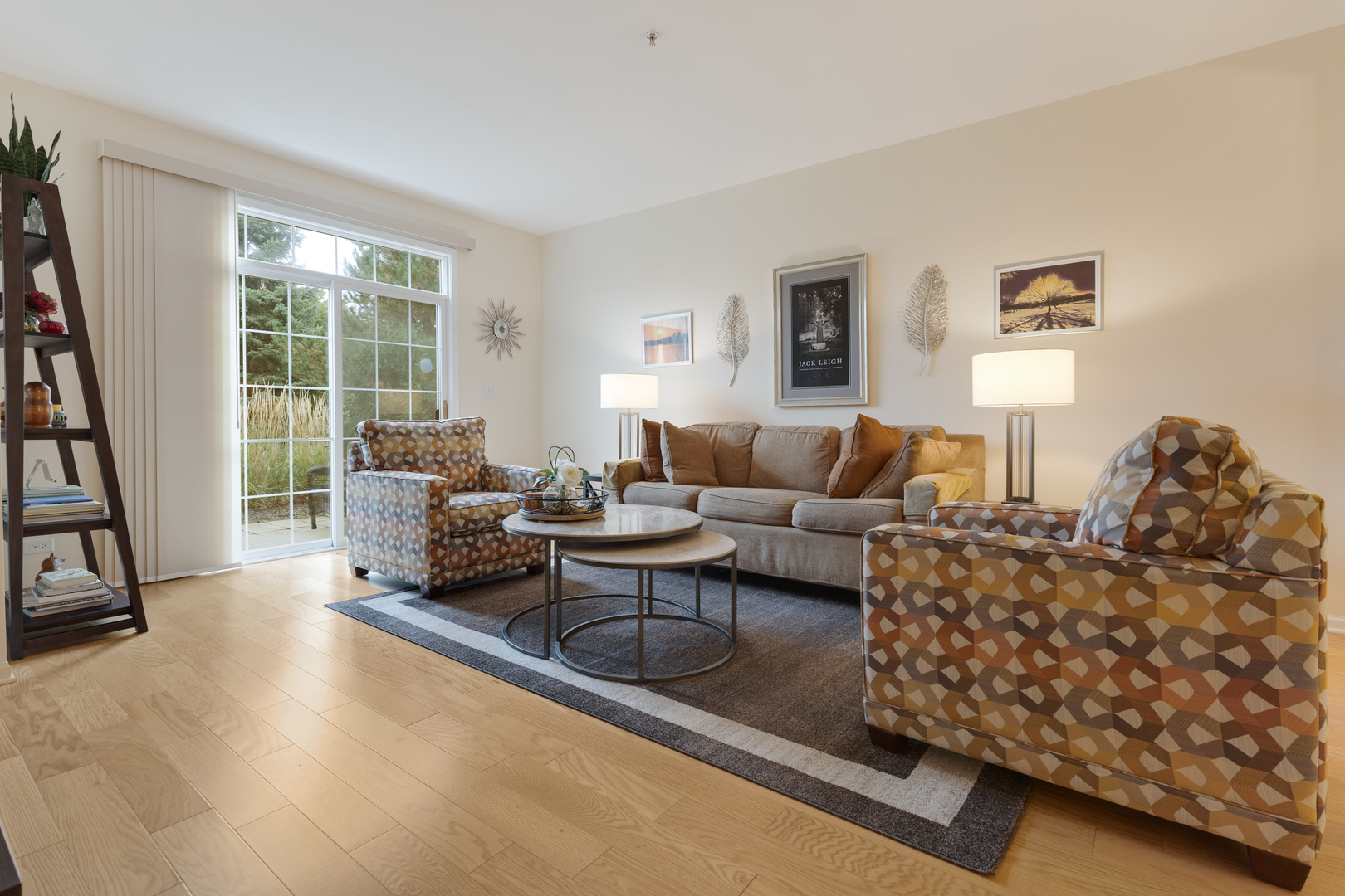 1386 Scarboro Road, Unit 1102 Schaumburg, IL 60193 - Photo 13 of 26 a living room with furniture and a window