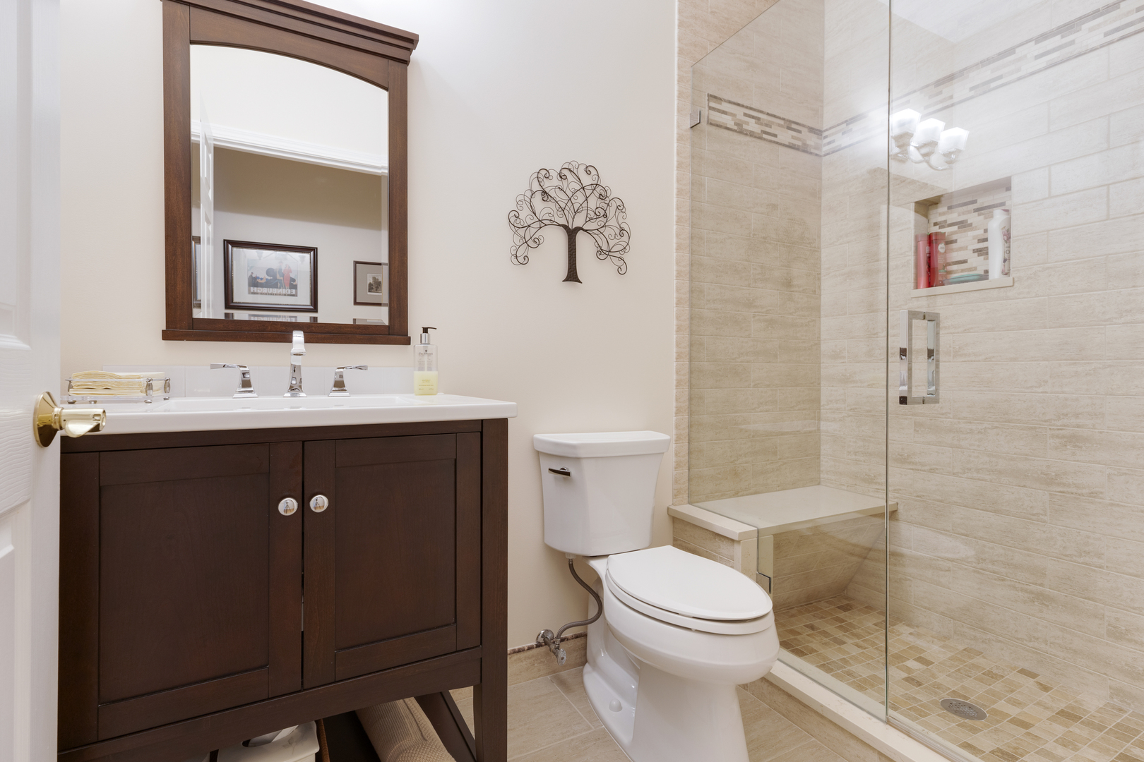 1386 Scarboro Road, Unit 1102 Schaumburg, IL 60193 - Photo 21 of 26 a bathroom with a sink a toilet and shower