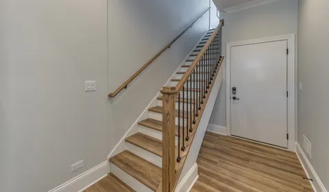 a view of entryway with wooden floor