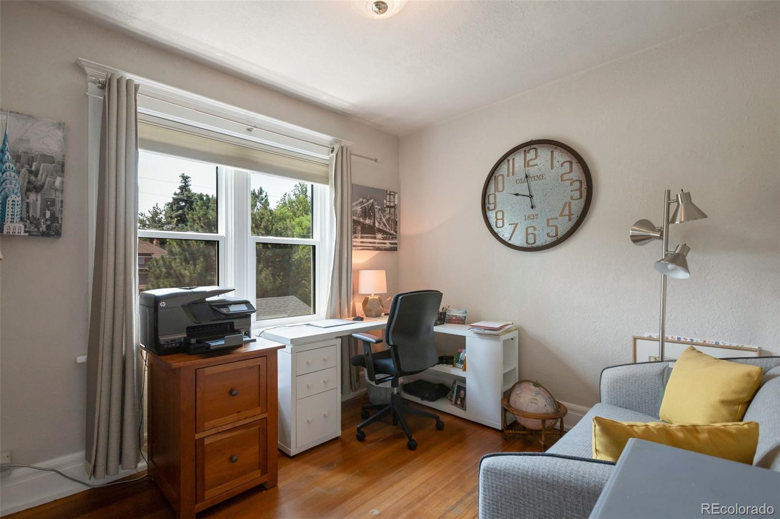 3732 Alcott Street Denver, CO 80211 - Photo 17 of 19 a view of a workspace with furniture and a window