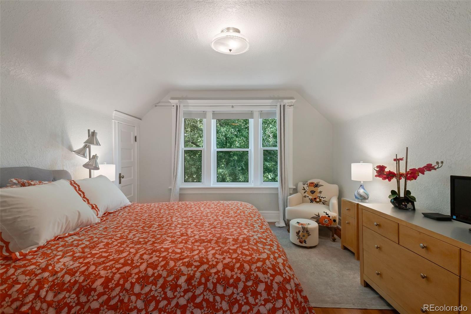 3732 Alcott Street Denver, CO 80211 - Photo 5 of 19 a bedroom with a bed and a window