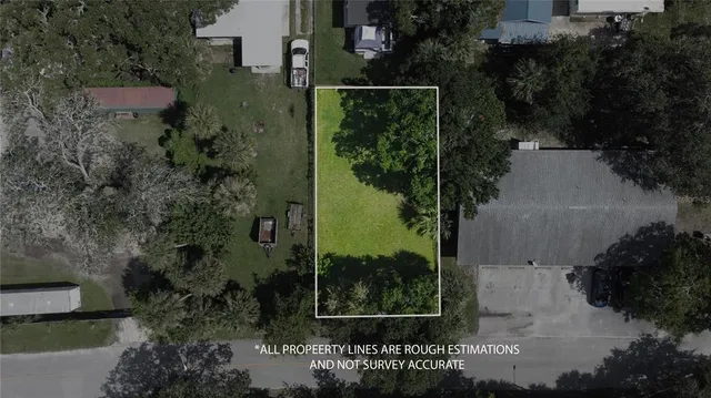 an aerial view of residential house with outdoor space