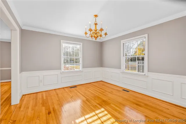 a spacious bedroom with a large bed and a window
