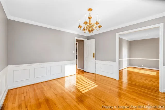 a view of an empty room with a bathroom