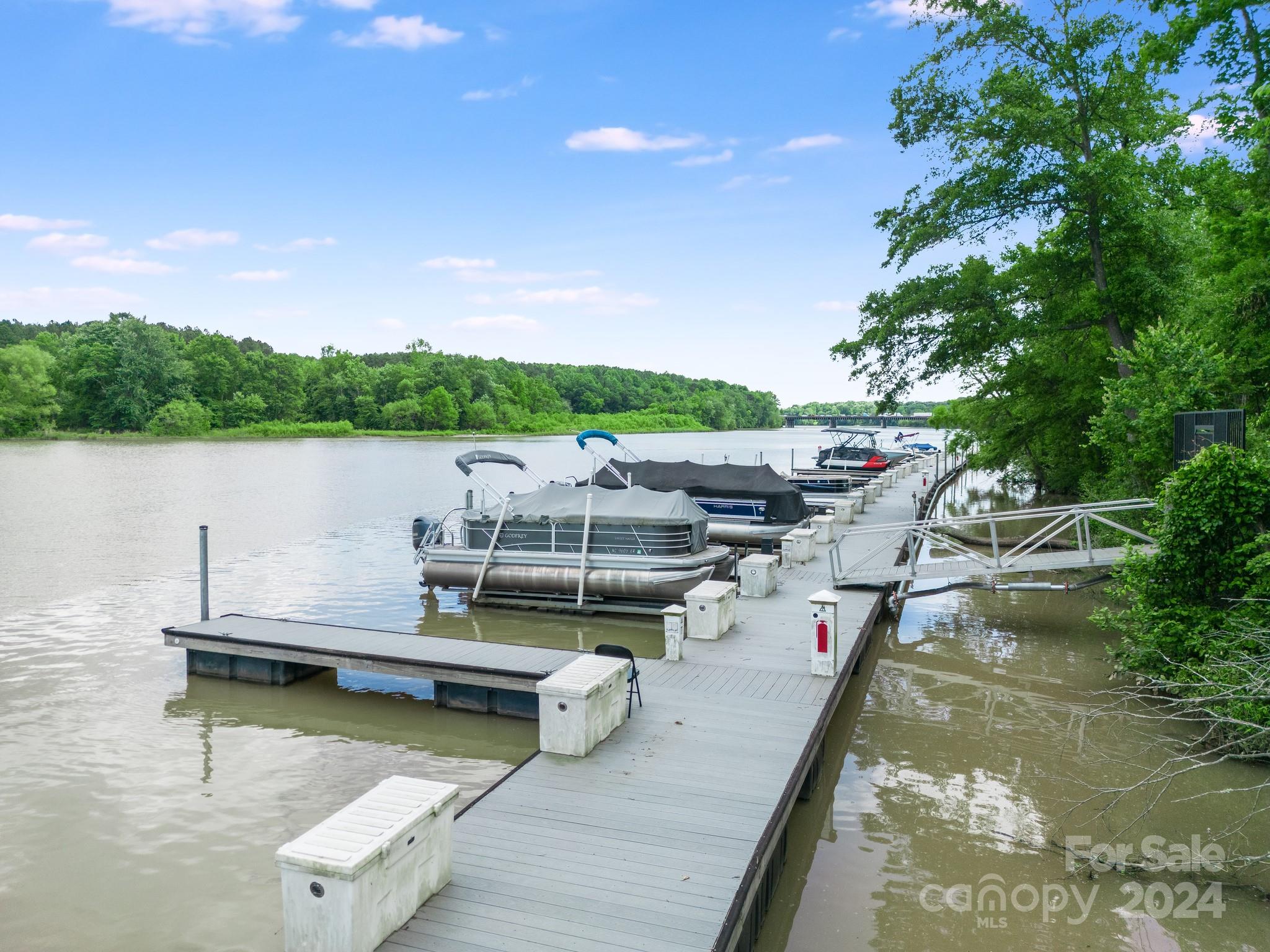 805 River Park Road Belmont, NC 28012 - Photo 1 of 21 a view of a lake with boats