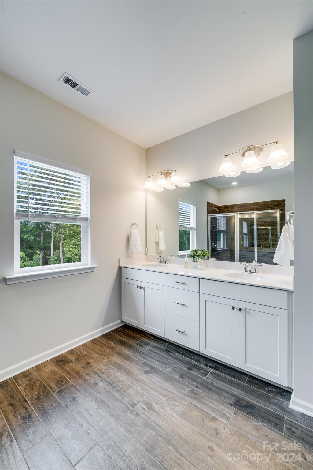 805 River Park Road Belmont, NC 28012 - Photo 13 of 21 a large white kitchen with sink and window