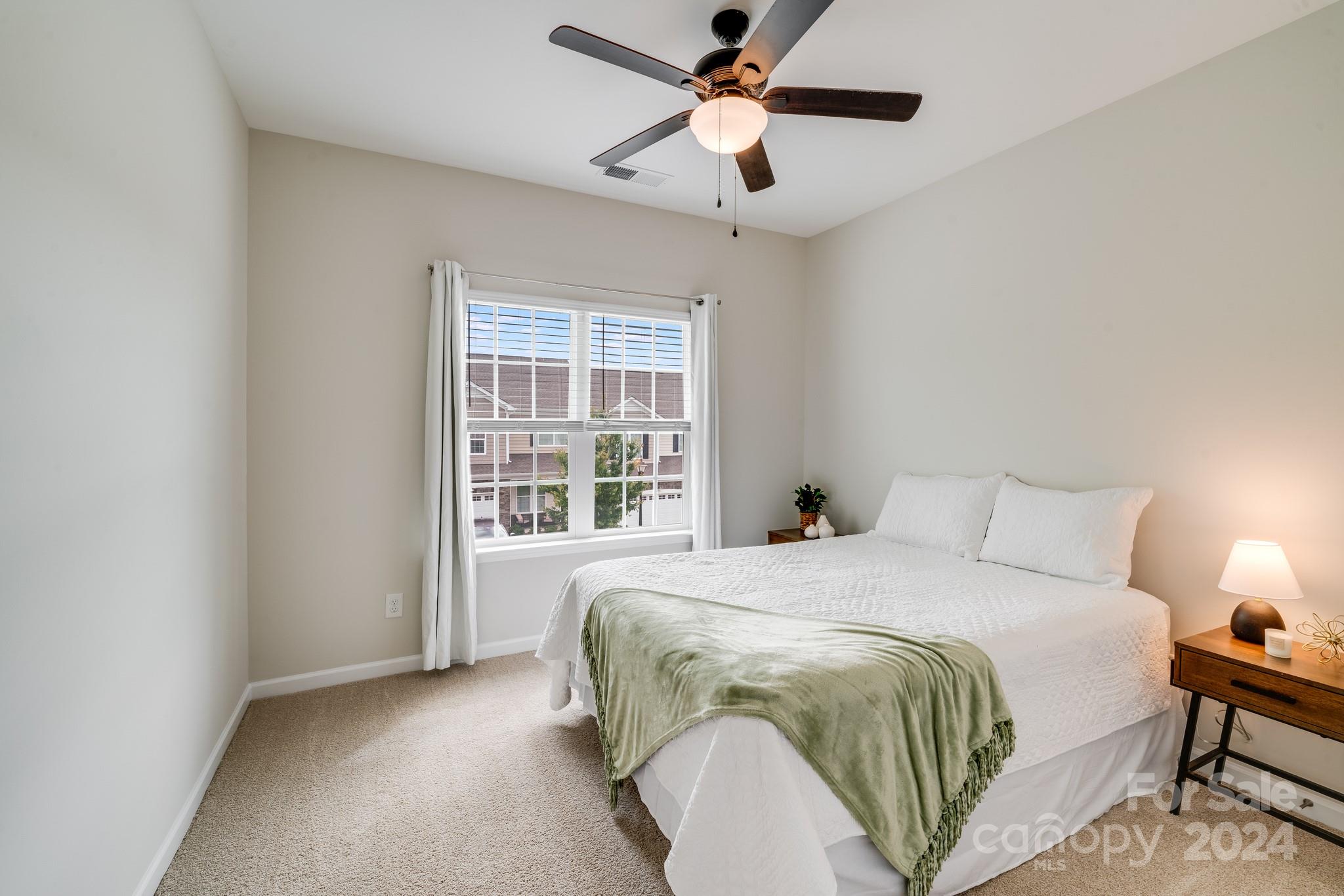 805 River Park Road Belmont, NC 28012 - Photo 15 of 21 a bedroom with a bed and a window