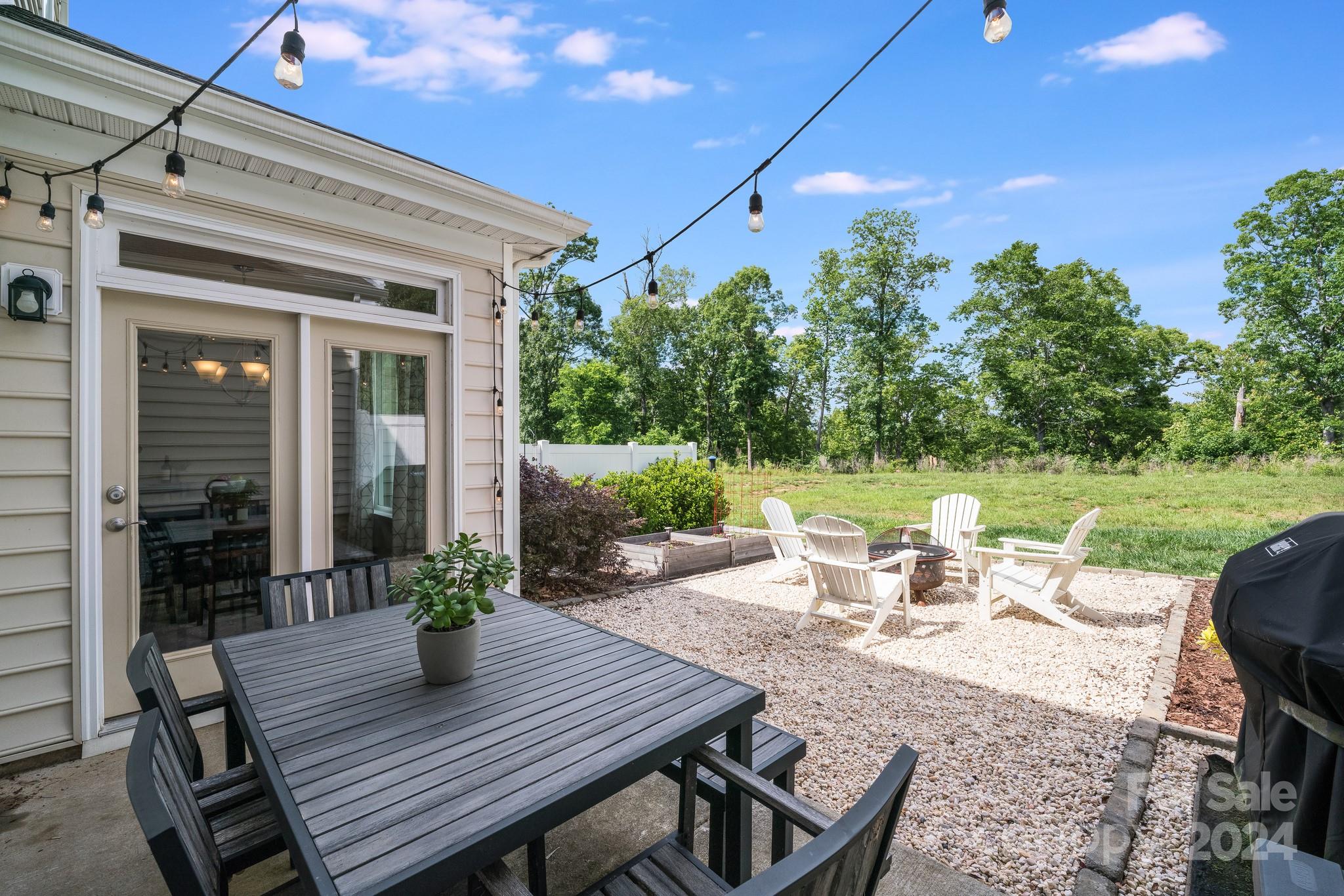 805 River Park Road Belmont, NC 28012 - Photo 19 of 21 a view of a table and chairs in patio of the house