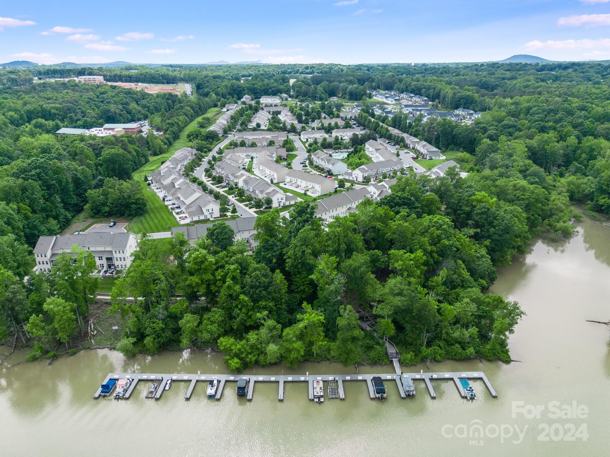 805 River Park Road Belmont, NC 28012 - Photo 20 of 21 a view of a lake with houses