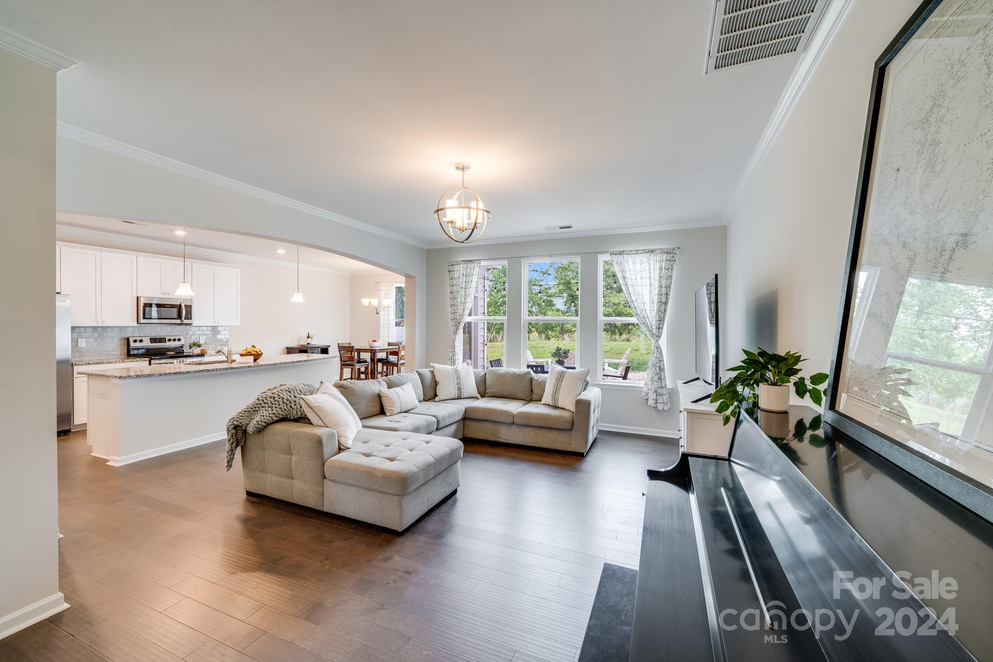 805 River Park Road Belmont, NC 28012 - Photo 4 of 21 a living room with furniture and a large window