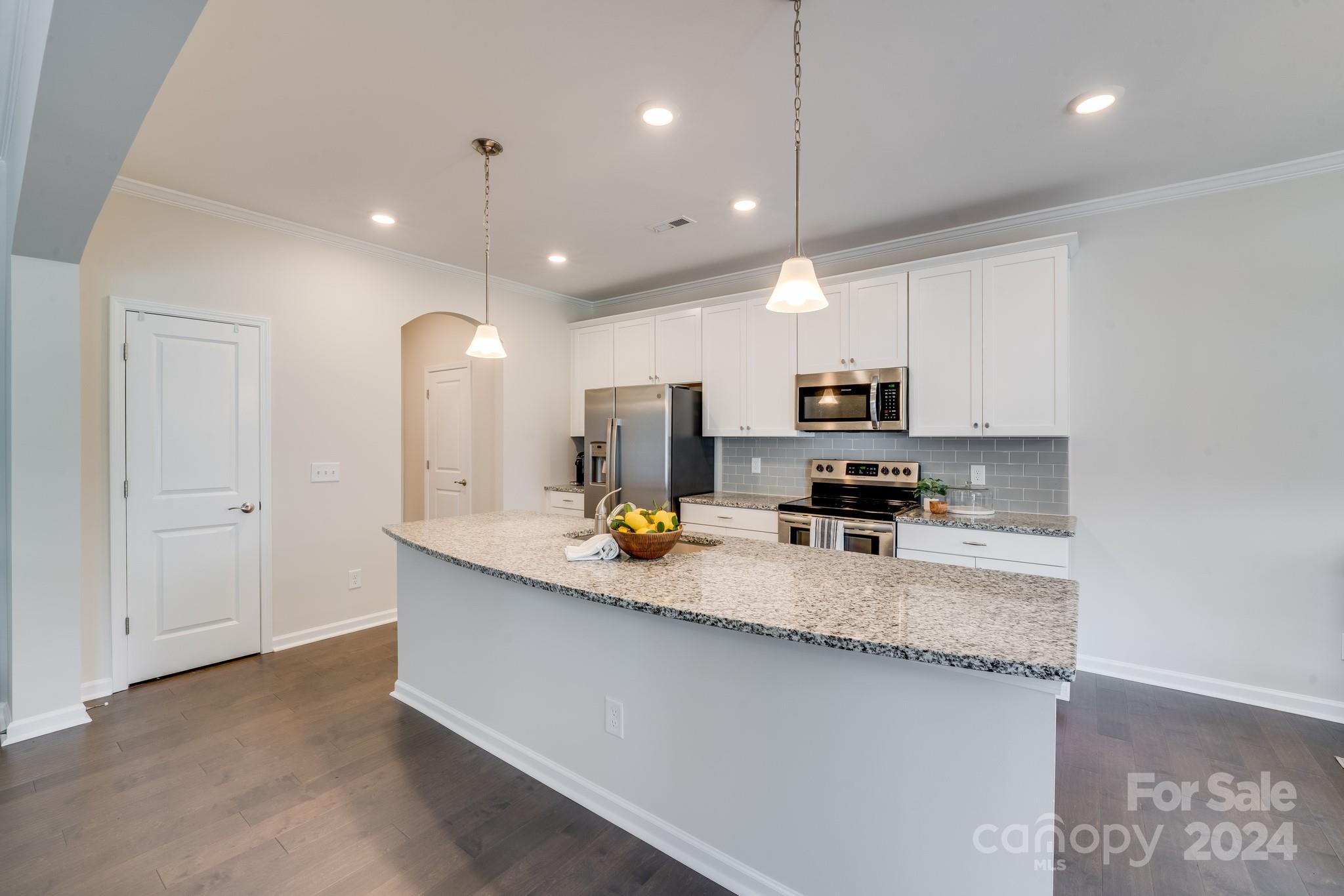 805 River Park Road Belmont, NC 28012 - Photo 5 of 21 a large kitchen with a lot of counter space and a sink