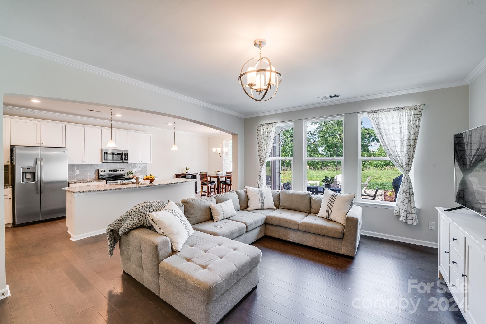 805 River Park Road Belmont, NC 28012 - Photo 7 of 21 a living room with furniture fireplace and a large window