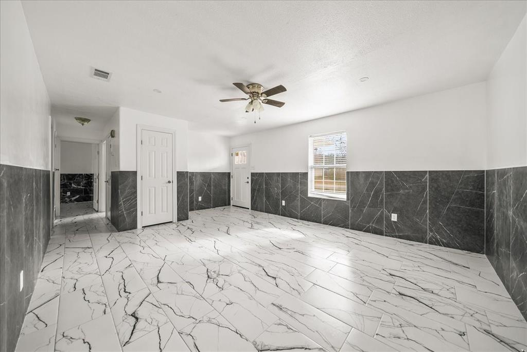 5507 Alexander Street Sachse, TX 75048 - Photo 9 of 18 a view of kitchen with a sink and a refrigerator
