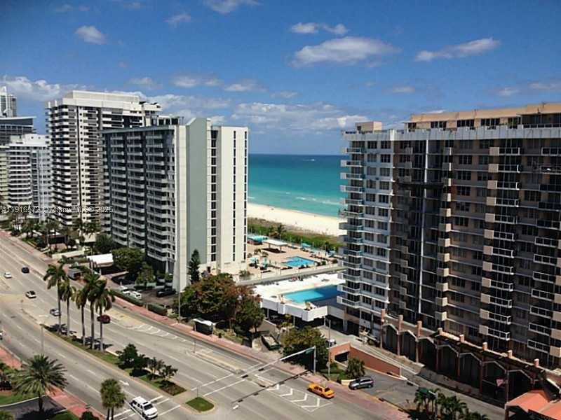 5600 Collins Avenue, Unit 17T Miami Beach, FL 33140 - Photo 35 of 52 a city view with tall buildings