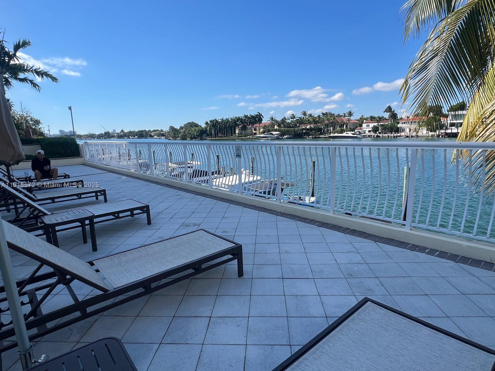 5600 Collins Avenue, Unit 17T Miami Beach, FL 33140 - Photo 51 of 52 a view of a terrace with sitting area
