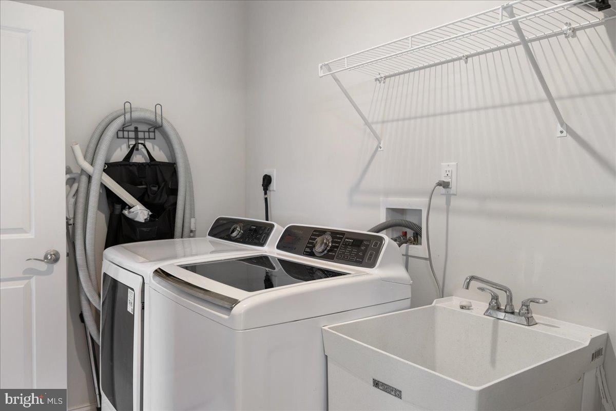 93 Lavender Drive Yardley, PA 19067 - Photo 22 of 47 Main Level Laundry Room with laundry sink
