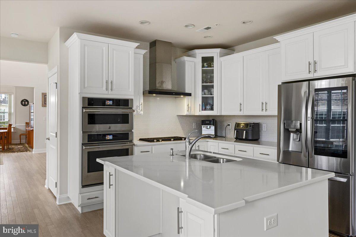 93 Lavender Drive Yardley, PA 19067 - Photo 8 of 47 Top-of-the-line Kitchen with stainless range hood