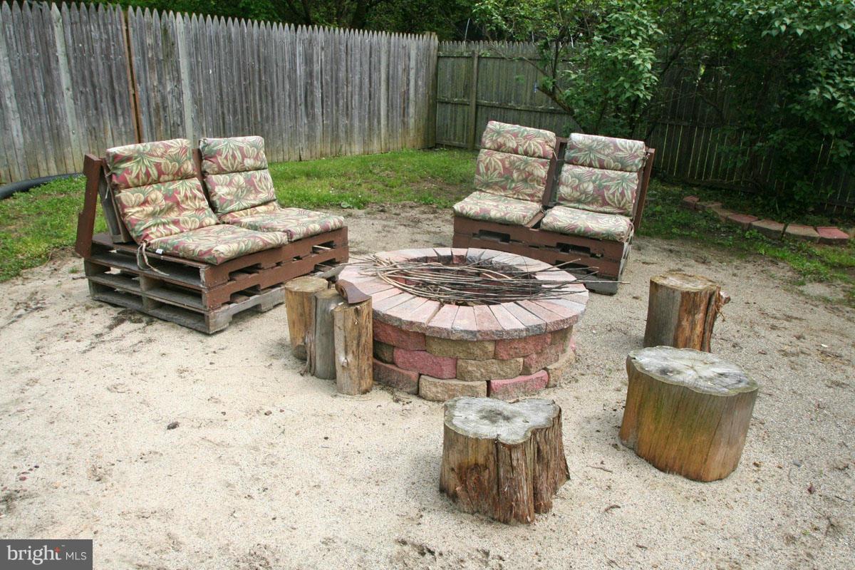 131 Oakwood Road Edgewater, MD 21037 - Photo 4 of 30 Exterior (Rear) Fire Pit