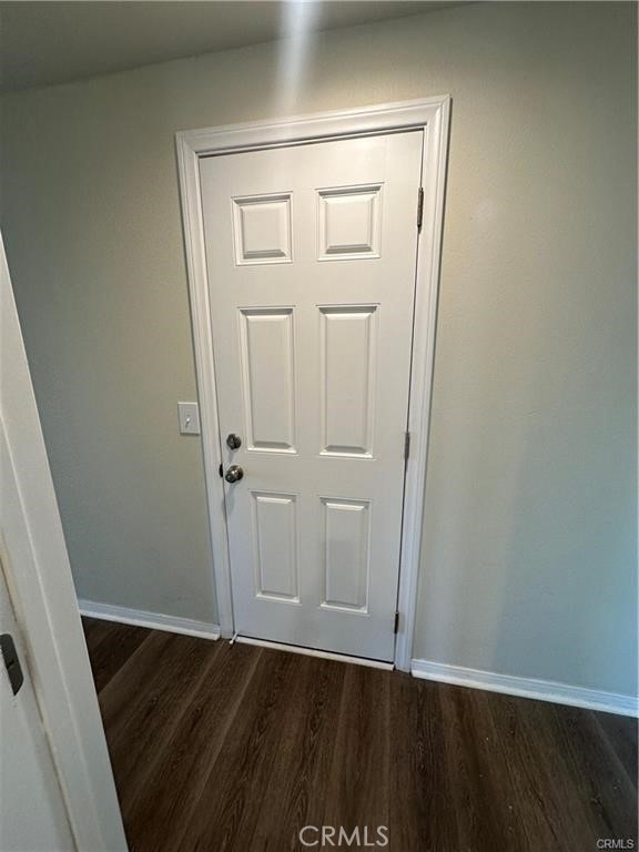 12830 6th Street, Unit 14 Yucaipa, CA 92399 - Photo 15 of 16 an empty room with wooden floor