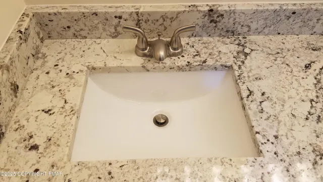 a view of bathroom with wooden floor