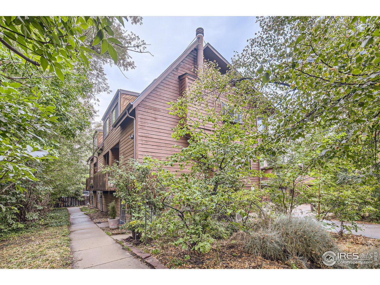 815 Alpine Avenue, Unit 4 Boulder, CO 80304 - Photo 12 of 27 a view of a yard with plants