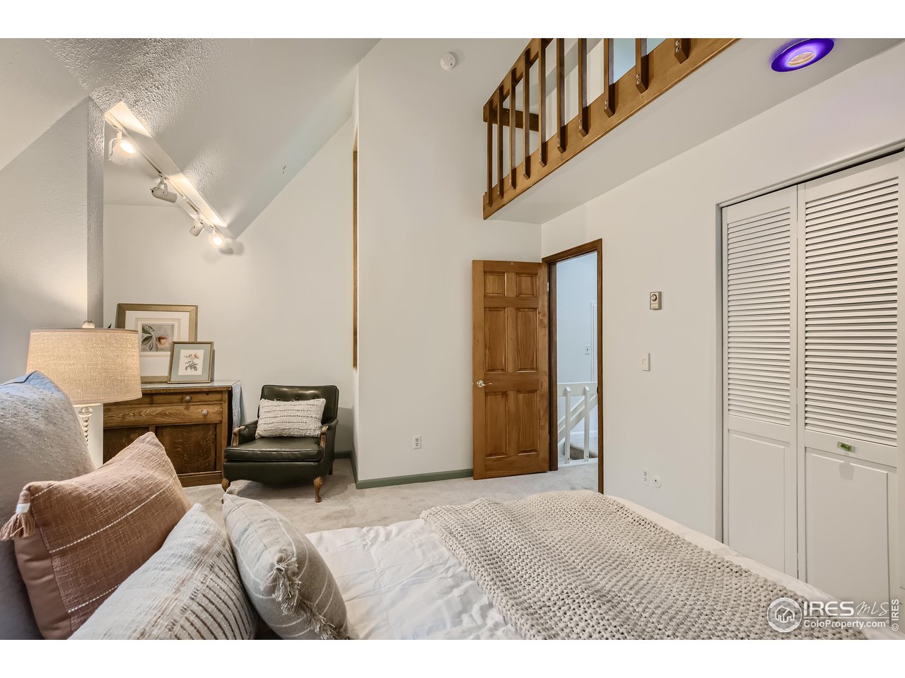 815 Alpine Avenue, Unit 4 Boulder, CO 80304 - Photo 17 of 27 a bedroom with furniture and a window